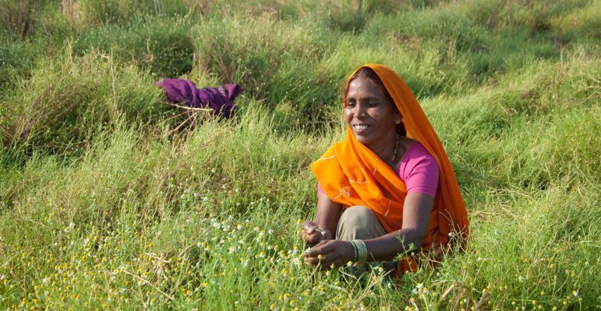 Woman sits on a hill