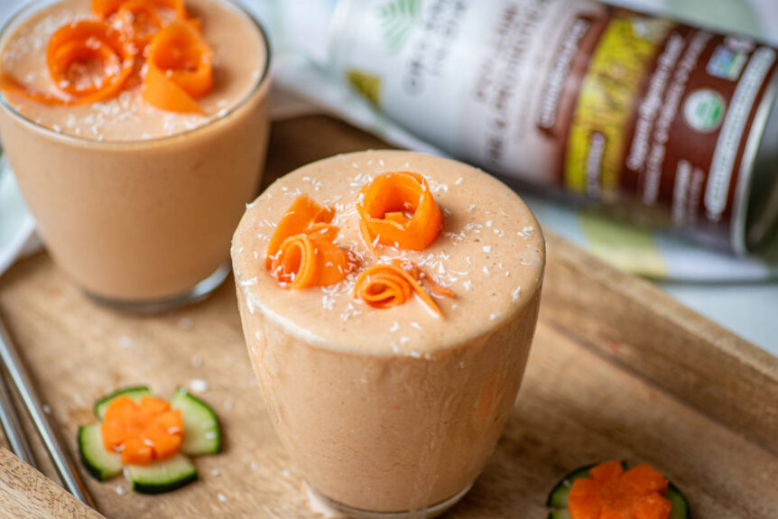 Carrot cake smoothie with fresh carrot garnish and cinnamon spice flavor Psyllium Pre & Probiotic Fiber
