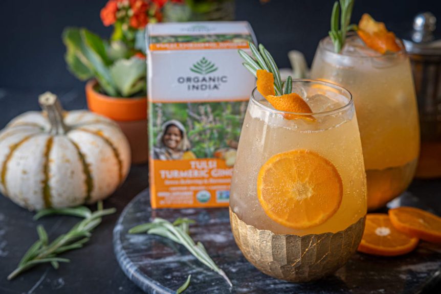 Ginger mule mocktail with tulsi turmeric ginger tea and kombucha, organic garnish