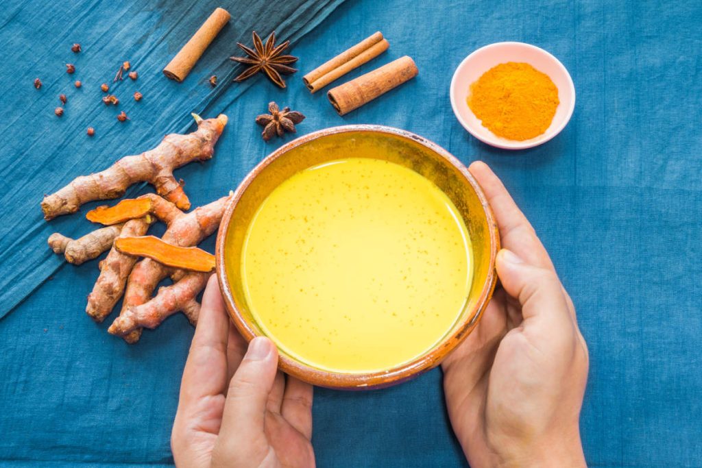 person drinking latte