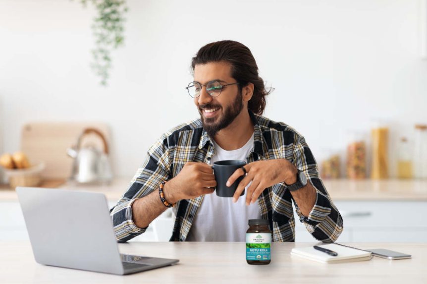 Gotu kola for men, man at computer working