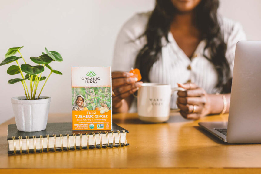 Herbs for Metabolism Women drinking Turmeric and Ginger Tea
