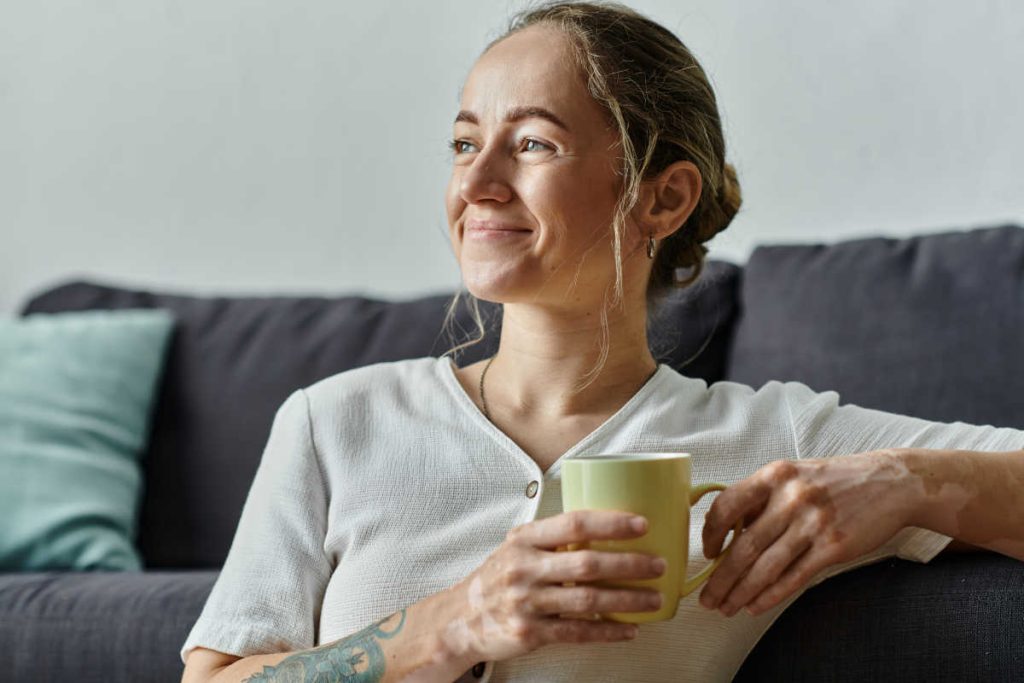 Woman in her 40s drinking herbal tea