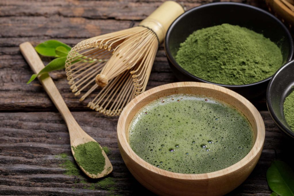 matcha latte and whisk
