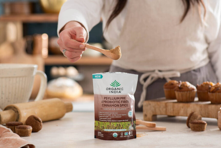 Woman using psyllium in gluten free baking muffins.
