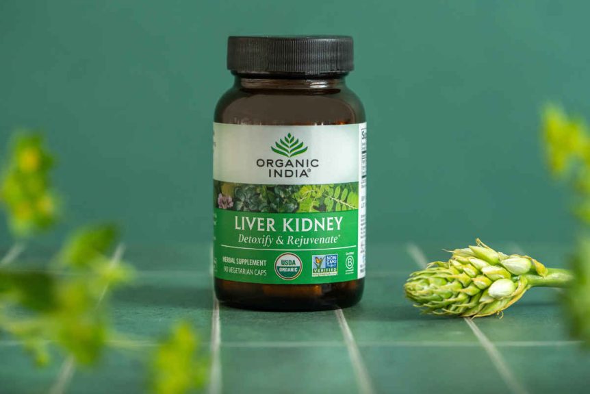 Punarnava benefits capsules for liver kidney health, organic on green tile table.