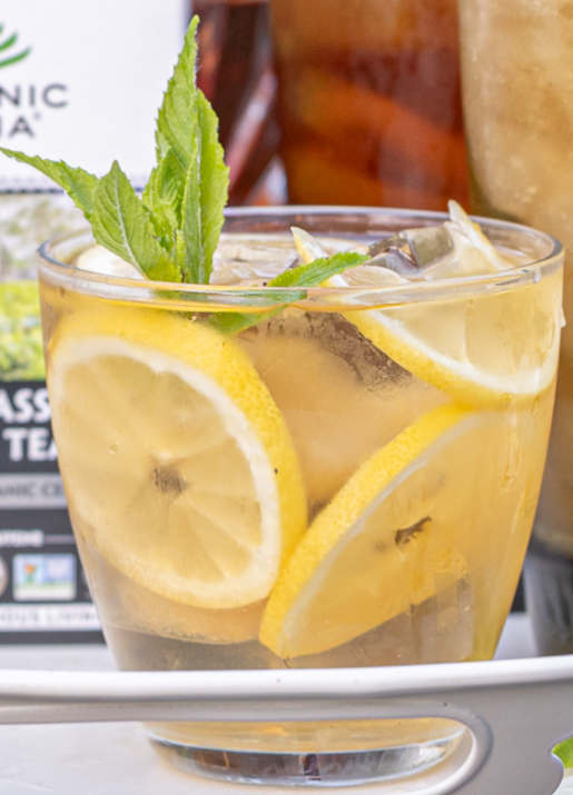 Cold Brew Chamomile ROC™ Tea in short glass with fresh lemon