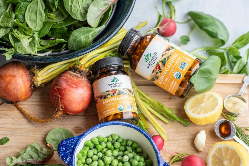 Spring salad ingredients pas, beets, spinach with ashwagandha vinaigrette
