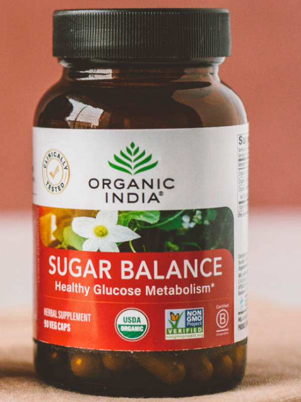 Sugar balance capsules in supplement bottle.
