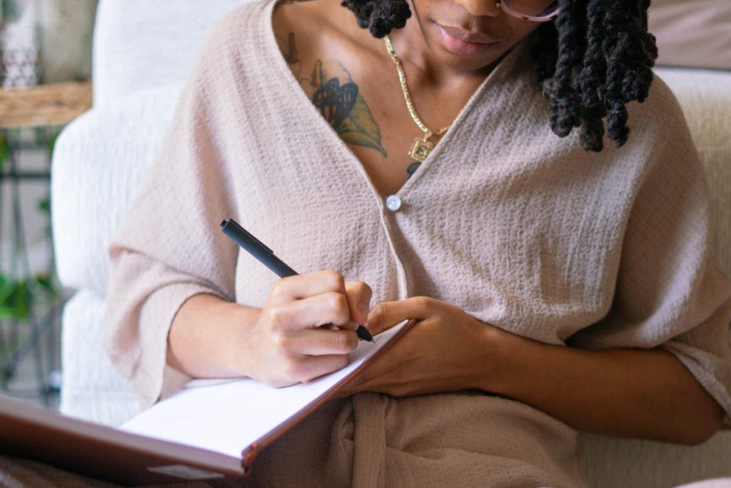 Women writing affirmations